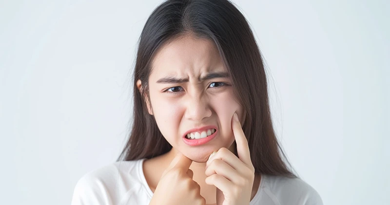 ผู้หญิงเจ็บฟัน